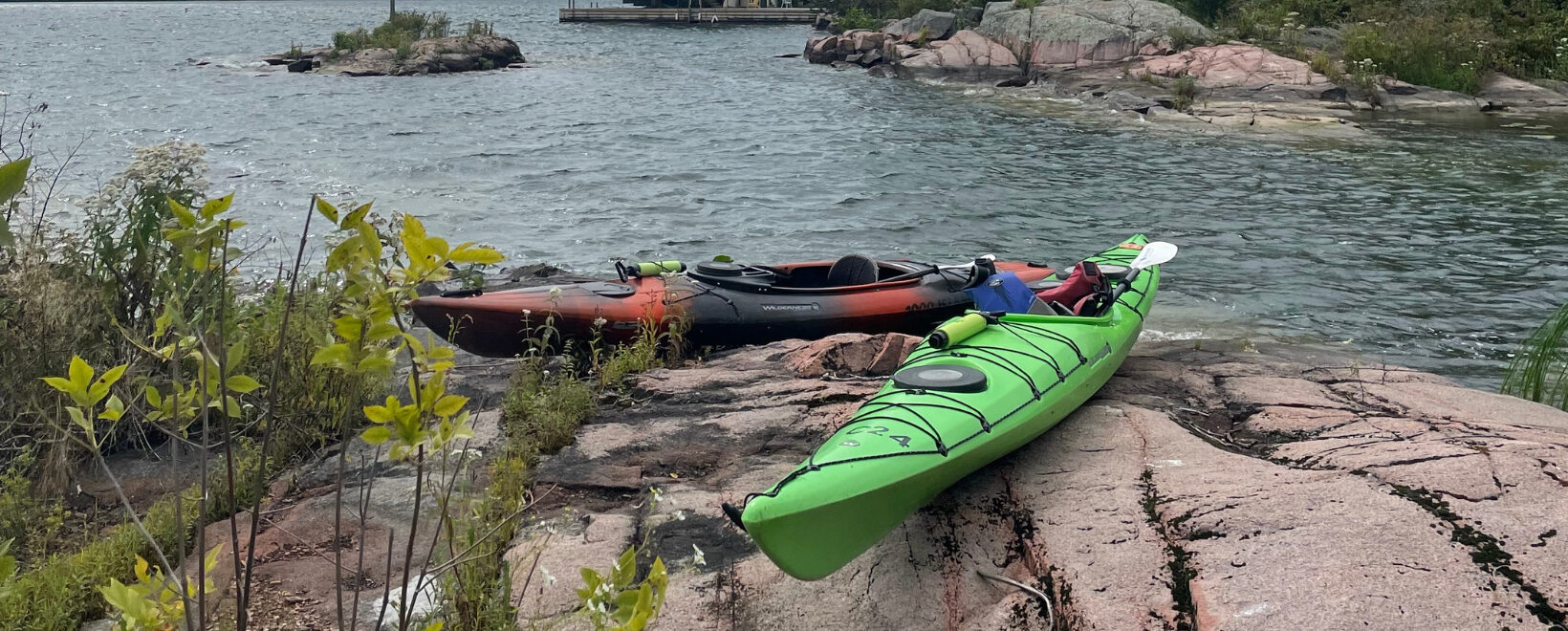 kayaks on rocks