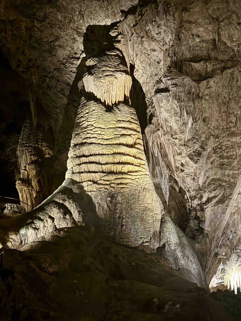 large Stalagmite in a dark cave at carlsbad caverns national park