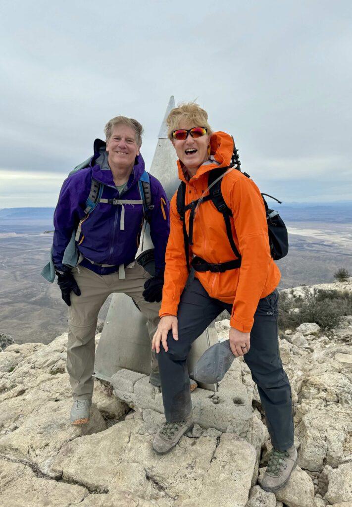 two men on top of guadalupe peak, gaudalupe national park